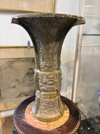 A Chinese archaic bronze wine vessel with Taotie design, Zun 尊, late Shang