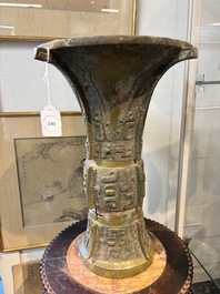 A Chinese archaic bronze wine vessel with Taotie design, Zun 尊, late Shang