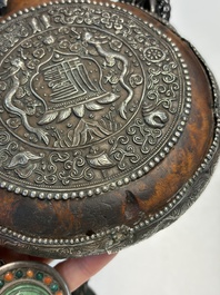A Tibetan red-coral and malachite-inlaid and silver-mounted 'Ba Ji Xiang' wine bottle, 19th C.