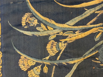 Two Chinese embroidered silk panels with antiquities and birds among flowering branches, 19th C.