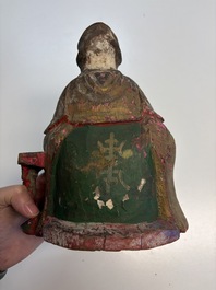 Eight Chinese carved wooden sculptures with traces of polychromy and gilding, 19th C.