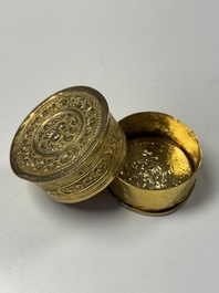 A fine Tibetan gilt-bronze box and cover with repouss&eacute; scroll decoration, 18th C.