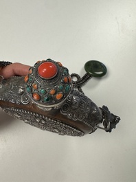 A Tibetan red-coral and malachite-inlaid and silver-mounted 'Ba Ji Xiang' wine bottle, 19th C.