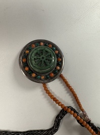 A Tibetan red-coral and malachite-inlaid and silver-mounted 'Ba Ji Xiang' wine bottle, 19th C.
