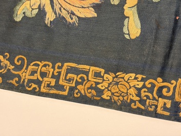 Two Chinese embroidered silk panels with antiquities and birds among flowering branches, 19th C.