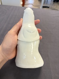 Two Chinese Dehua blanc de Chine groups of Guanyin and a vase with lion-head handles, 18th C. and later