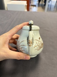 A Chinese gilt-decorated iron-red 'Fei Ming Su Shi 飛鳴宿食' teapot and cover, Qianlong