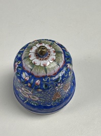 A Chinese Canton blue-ground enamel ewer and cover with floral design, 19th C.