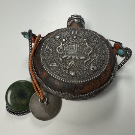 A Tibetan red-coral and malachite-inlaid and silver-mounted 'Ba Ji Xiang' wine bottle, 19th C.