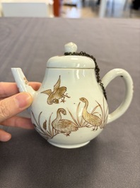 A Chinese gilt-decorated iron-red 'Fei Ming Su Shi 飛鳴宿食' teapot and cover, Qianlong