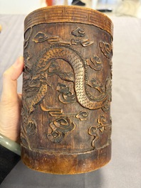 A Chinese enamelled Yixing stoneware teapot, a pewter container, a horn cup, a bamboo brush pot, and an opium pipe, Wan Shun 萬順 mark, 19/20th C.