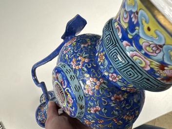 A Chinese Canton blue-ground enamel ewer and cover with floral design, 19th C.