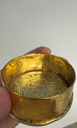 A fine Tibetan gilt-bronze box and cover with repouss&eacute; scroll decoration, 18th C.