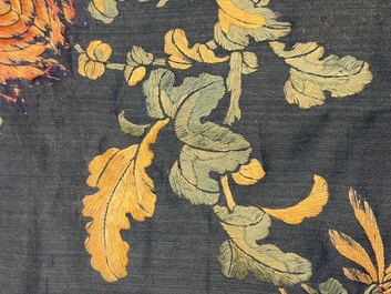 Two Chinese embroidered silk panels with antiquities and birds among flowering branches, 19th C.