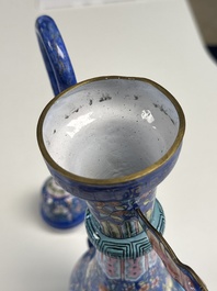 A Chinese Canton blue-ground enamel ewer and cover with floral design, 19th C.