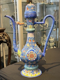 A Chinese Canton blue-ground enamel ewer and cover with floral design, 19th C.