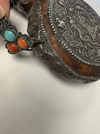 A Tibetan red-coral and malachite-inlaid and silver-mounted 'Ba Ji Xiang' wine bottle, 19th C.