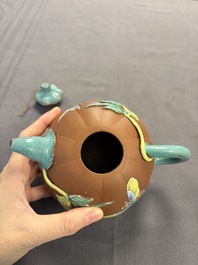 A Chinese enamelled Yixing stoneware teapot, a pewter container, a horn cup, a bamboo brush pot, and an opium pipe, Wan Shun 萬順 mark, 19/20th C.