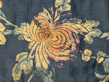 Two Chinese embroidered silk panels with antiquities and birds among flowering branches, 19th C.