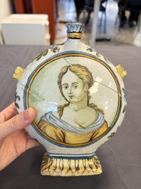 A polychrome Italian maiolica pilgrim bottle with two portrait busts, Castelli, 18th C.