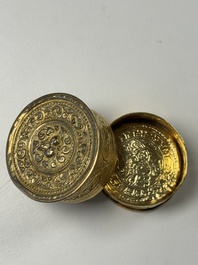 A fine Tibetan gilt-bronze box and cover with repouss&eacute; scroll decoration, 18th C.