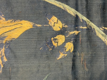 Two Chinese embroidered silk panels with antiquities and birds among flowering branches, 19th C.