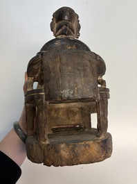 Eight Chinese carved wooden sculptures with traces of polychromy and gilding, 19th C.