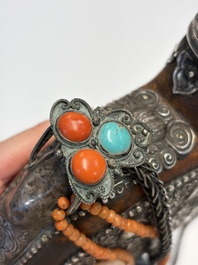 A Tibetan red-coral and malachite-inlaid and silver-mounted 'Ba Ji Xiang' wine bottle, 19th C.