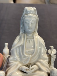 Two Chinese Dehua blanc de Chine groups of Guanyin and a vase with lion-head handles, 18th C. and later
