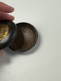 A fine Chinese parcel-gilt bronze 'Bird Among Blossoming Plum Branches' box and cover, 18th C.