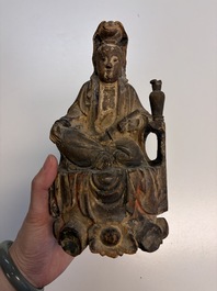 Eight Chinese carved wooden sculptures with traces of polychromy and gilding, 19th C.