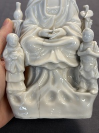 Two Chinese Dehua blanc de Chine groups of Guanyin and a vase with lion-head handles, 18th C. and later