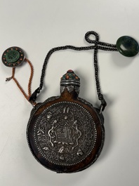 A Tibetan red-coral and malachite-inlaid and silver-mounted 'Ba Ji Xiang' wine bottle, 19th C.