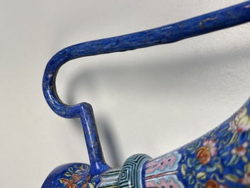 A Chinese Canton blue-ground enamel ewer and cover with floral design, 19th C.