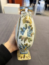 A polychrome Italian maiolica pilgrim bottle with two portrait busts, Castelli, 18th C.
