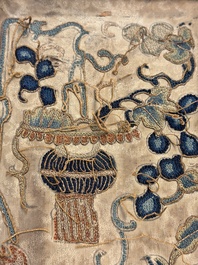 Two Chinese embroidered silk panels with antiquities and birds among flowering branches, 19th C.