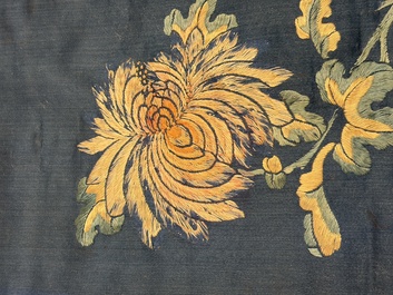 Two Chinese embroidered silk panels with antiquities and birds among flowering branches, 19th C.