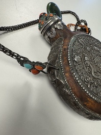 A Tibetan red-coral and malachite-inlaid and silver-mounted 'Ba Ji Xiang' wine bottle, 19th C.