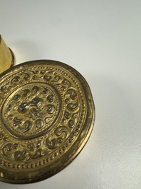 A fine Tibetan gilt-bronze box and cover with repouss&eacute; scroll decoration, 18th C.