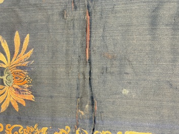 Two Chinese embroidered silk panels with antiquities and birds among flowering branches, 19th C.