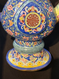 A Chinese Canton blue-ground enamel ewer and cover with floral design, 19th C.