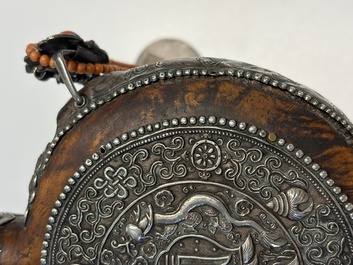 A Tibetan red-coral and malachite-inlaid and silver-mounted 'Ba Ji Xiang' wine bottle, 19th C.