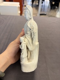 Two Chinese Dehua blanc de Chine groups of Guanyin and a vase with lion-head handles, 18th C. and later