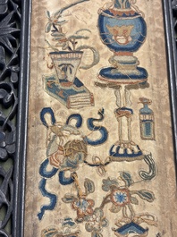 Two Chinese embroidered silk panels with antiquities and birds among flowering branches, 19th C.