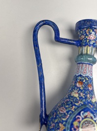 A Chinese Canton blue-ground enamel ewer and cover with floral design, 19th C.
