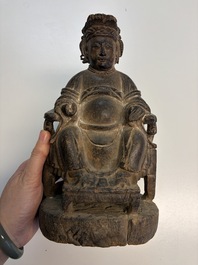 Eight Chinese carved wooden sculptures with traces of polychromy and gilding, 19th C.