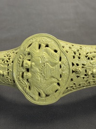 A large Chinese lemon-yellow-glazed biscuit 'Dragons' ruyi in the style of Wang Bingrong, on a wooden stand, Republic
