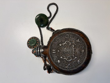 A Tibetan red-coral and malachite-inlaid and silver-mounted 'Ba Ji Xiang' wine bottle, 19th C.
