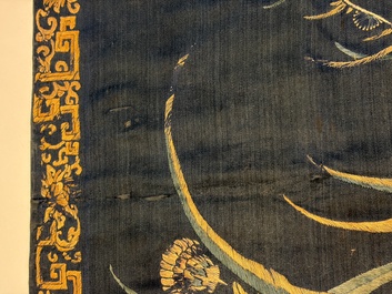 Two Chinese embroidered silk panels with antiquities and birds among flowering branches, 19th C.