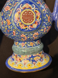 A Chinese Canton blue-ground enamel ewer and cover with floral design, 19th C.